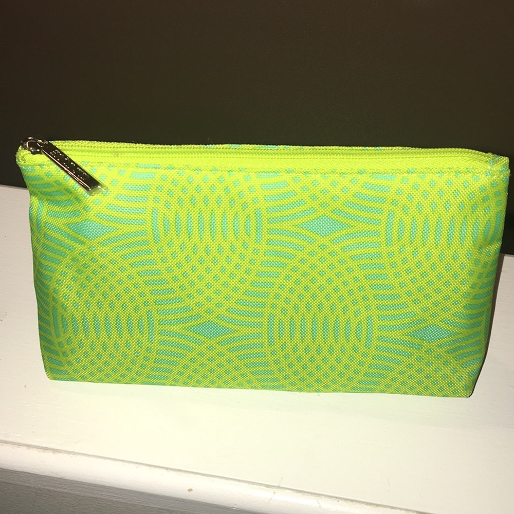 Clinique makeup bag with fun beauty items inside!